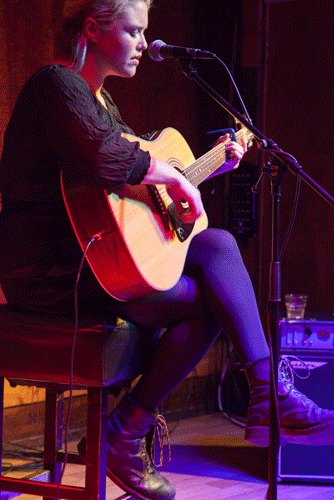 G.B. Wales, Newport. A local singer and songwriter Nia performs live at Warehouse 54's Open-Mic Night © Kate Mercer (2016)