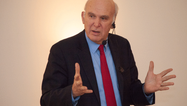 GB. WALES, Newport. Liberal Democrat Vince Cable, guest speaker for the evening event takes to the stage as part of the #LibDemFightback campaign. Author of the book 'After the Storm', Vince Cable discusses post-coallition politics, Conservative and Labour leadership and policies, as well as answering questions from guests and party members attending the event. 2016.